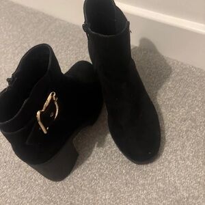 Chic Black Heeled Boots with Gold Buckle
